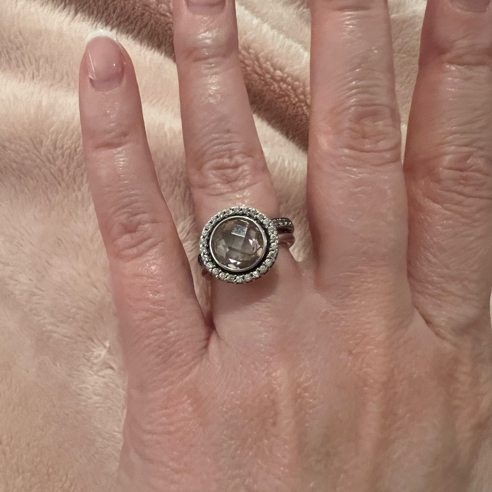 Pandora 925 Pink Round Stone size 5 3/4 & stacking band w/ stones all around.